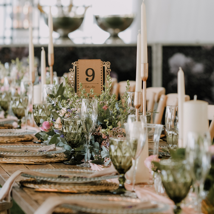 Wedding reception table with decorated table settings