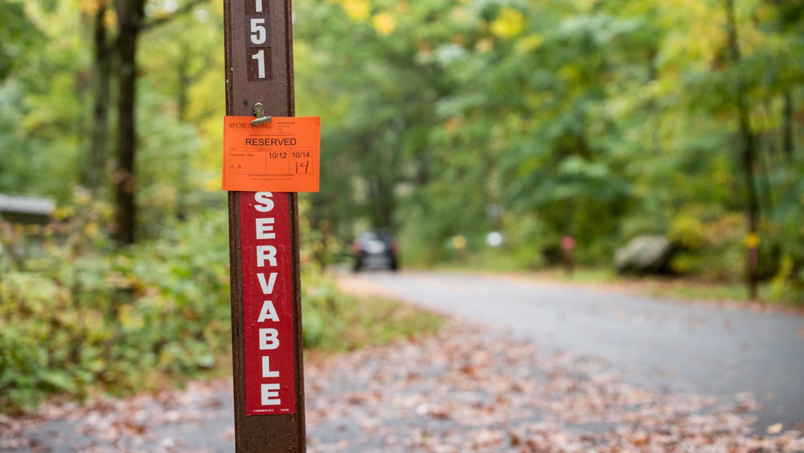 Campsite reservation sign