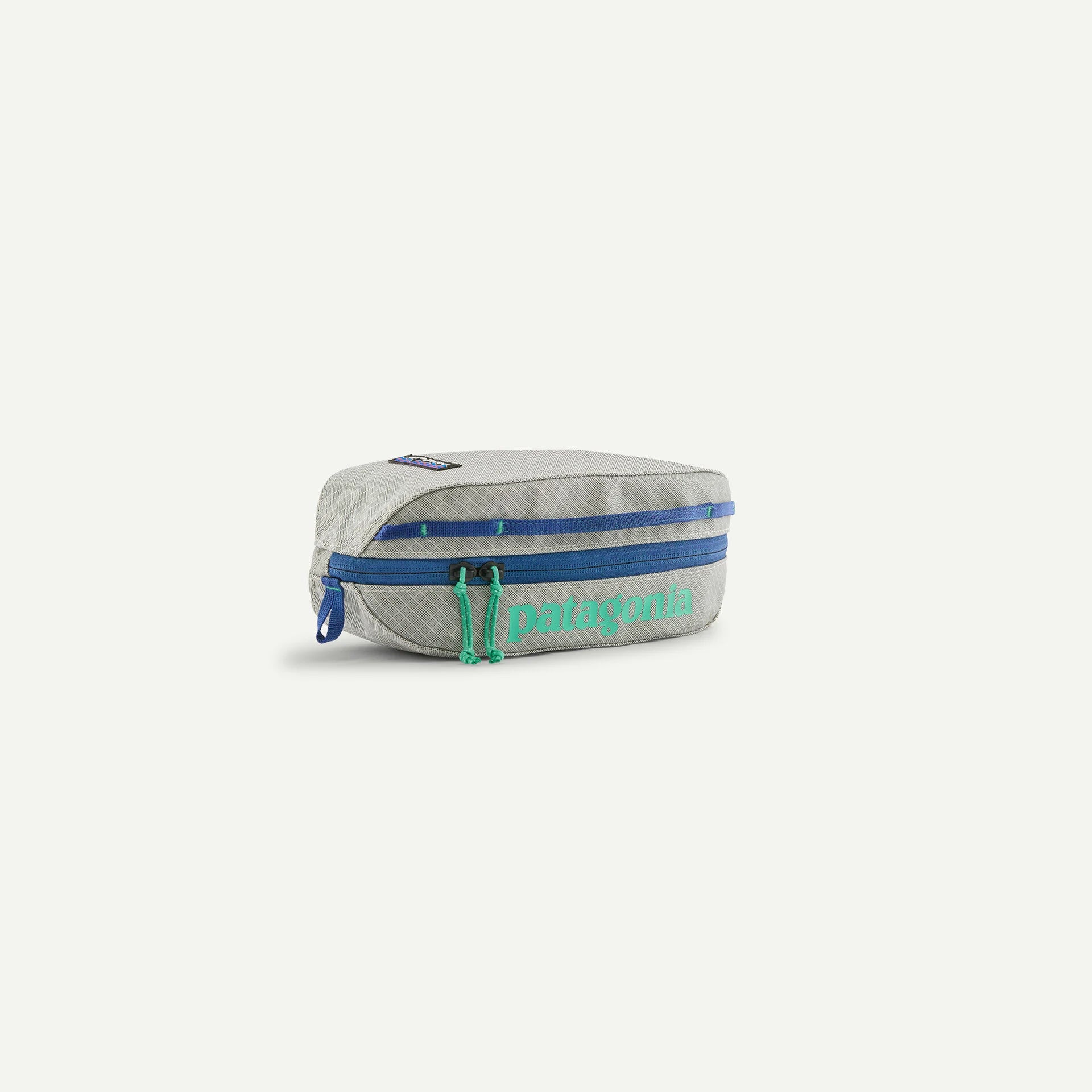 Gray pouch with blue zipper and green drawstrings on a white background