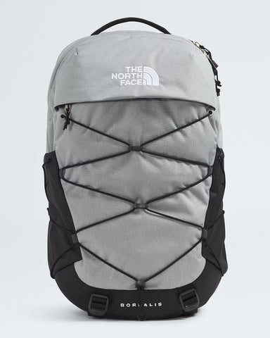 The North Face Borealis backpack in gray and black, featuring a front zippered pocket with crisscross compression straps, a top carry handle, and a white The North Face logo on the upper front.
