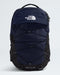 The North Face Boreal backpack in navy blue and black, featuring a white logo on the front flap and a white 'BORALIS' text on the bottom base, shown against a light gray background.