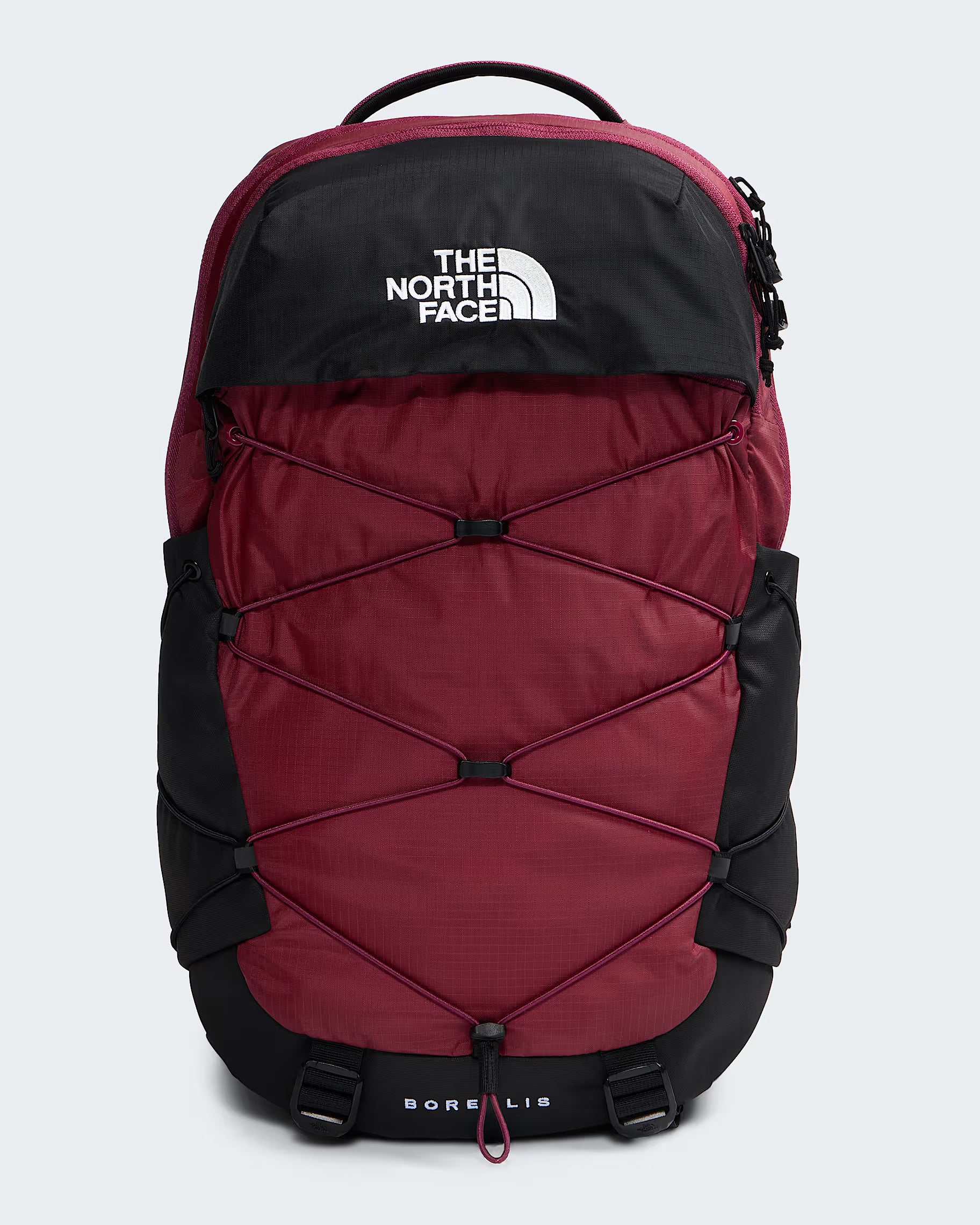 The North Face Borealis backpack in burgundy and black, featuring a top zip closure, top carry handle, and the brand's logo on the front.
