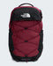 The North Face Borealis backpack in burgundy and black, featuring a top zip closure, top carry handle, and the brand's logo on the front.
