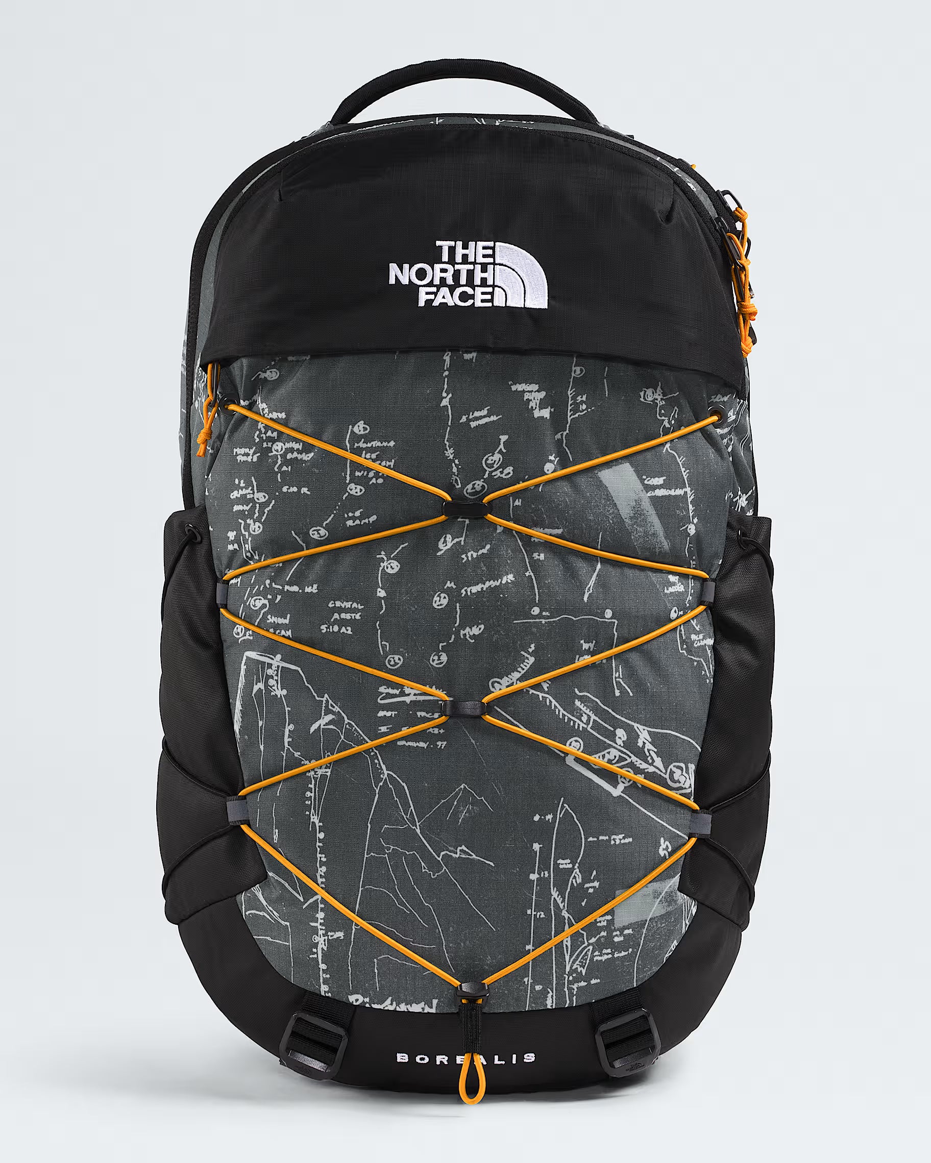 The North Face Bortlis backpack in black and dark gray with a white map print, featuring orange bungee cords and orange zipper pulls, shown on a light gray background.