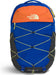 The North Face Soralis backpack in royal blue, orange, and black, featuring neon yellow compression straps and a white logo on the front.